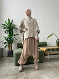 Beige wool jersey long sleeve tunic with waterproof skirt