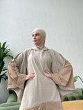 Elegant beige suit with wool jersey long sleeve tunic with waterproof beige flaredskirt