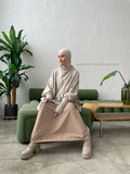 Beige wool jersey long sleeve tunic with waterproof skirt