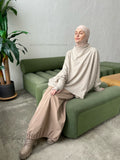 Beige wool jersey long sleeve tunic with waterproof skirt