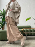 Beige wool jersey long sleeve tunic with waterproof skirt