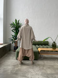 Beige wool jersey long sleeve tunic with waterproof skirt