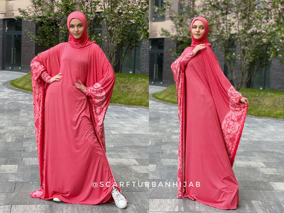 Stylish bright coral dress with attached hijab and long cuffs made of soft jersey with polka dots and lace print
